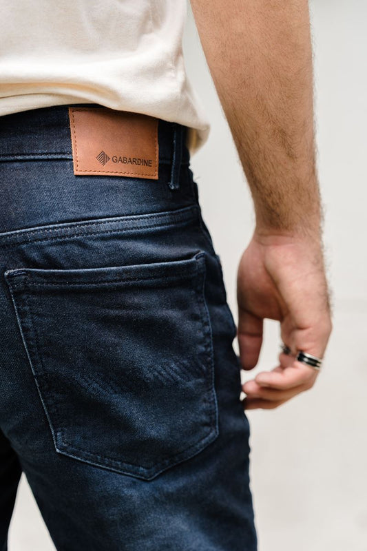 Heavily washed stretchable slim tapered fit Deep Blue Jeans