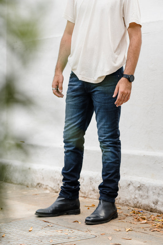 Heavily washed stretchable slim tapered fit Deep Blue Jeans